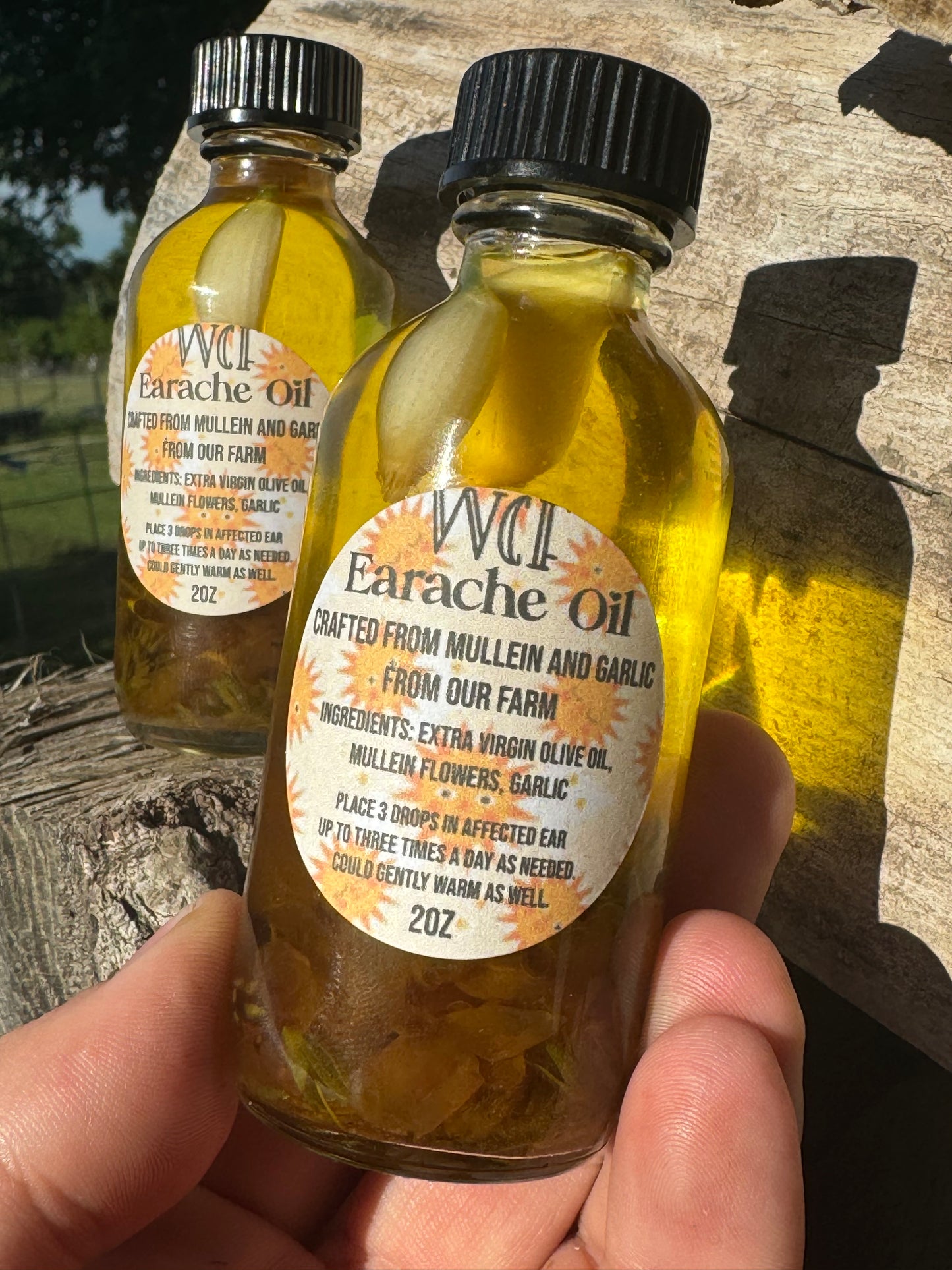 Earache Oil (extract virgin olive oil infused with garlic and mullein flowers from on and around our farm)